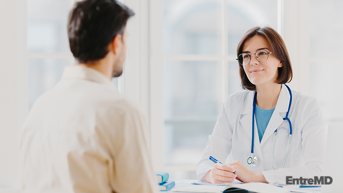 Doctor Communicating With Patient
