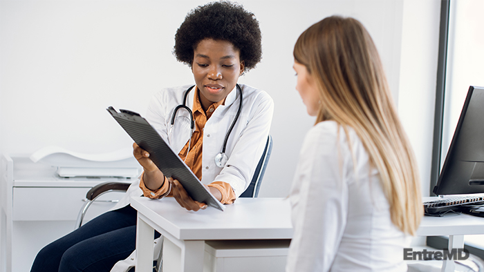 Physician Speaking With Patient