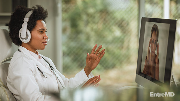 Doctor Speaking With Patient Remotely