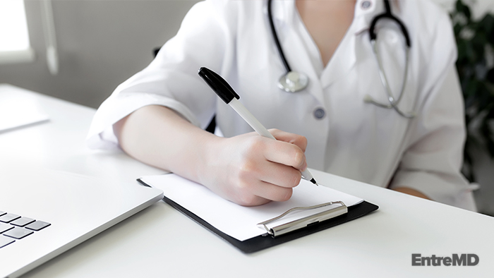Physician Writing a Medical Report