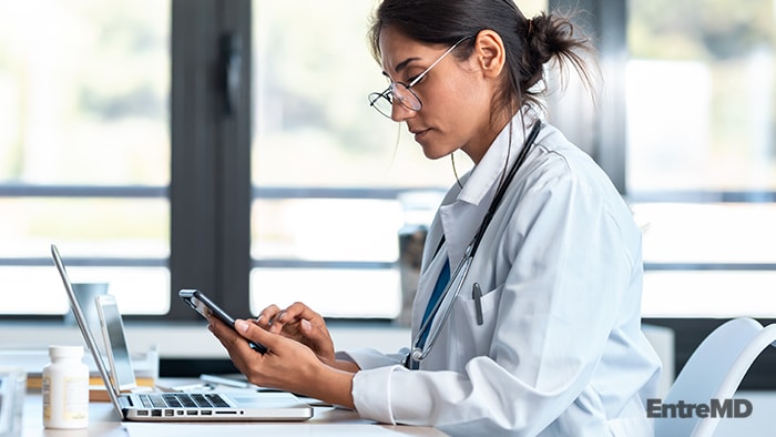 Healthcare Executive Checking Phone